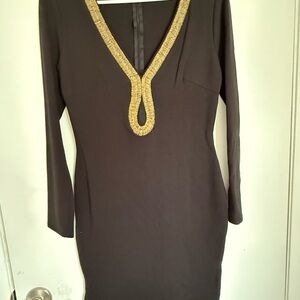 Elegant Black Dress with Gold Trim
